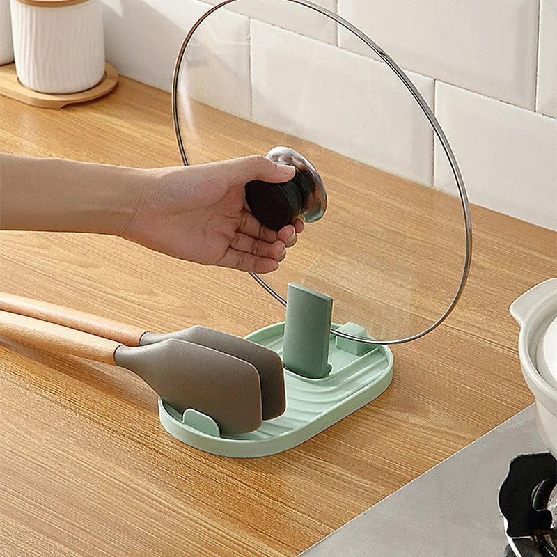 Lid and utensil holder